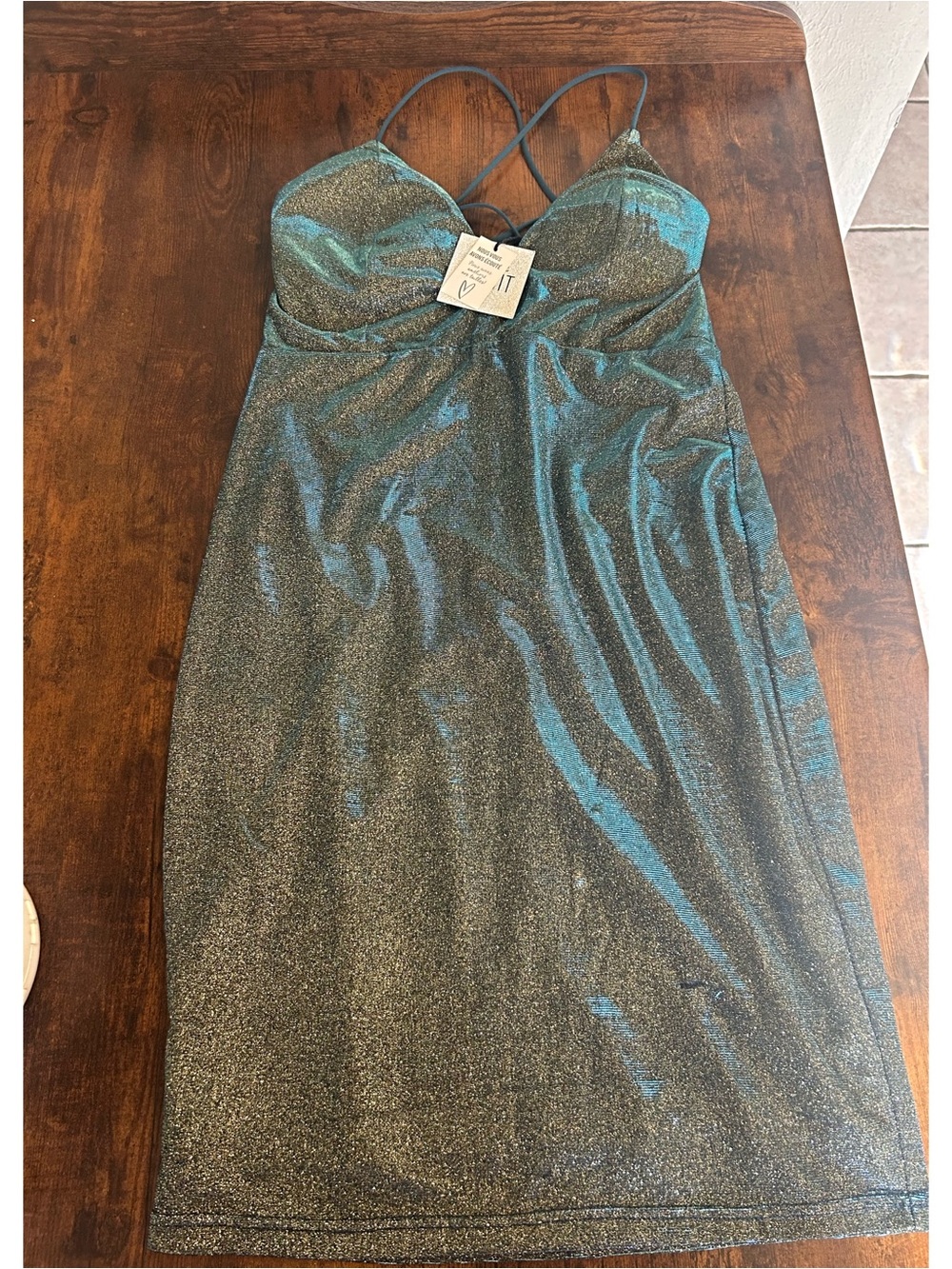 Two Y2K inspired bodycon Revamp La Nuit dresses.